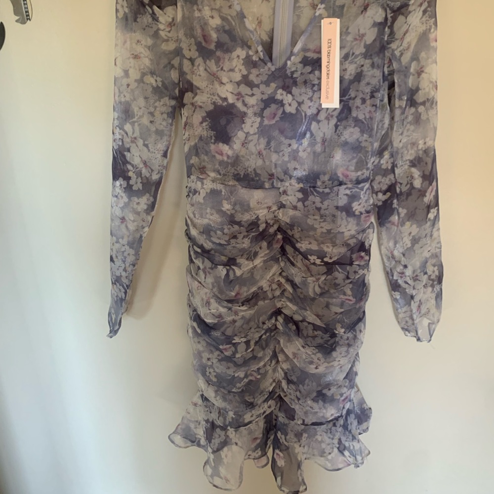 Very pretty metallic ruffle dress.